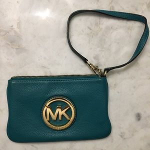 MICHAEL KORS wristlet. Teal. Gold embellishment